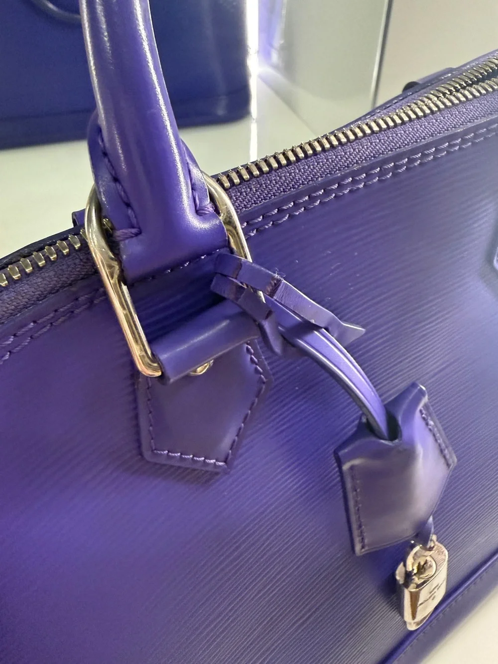 Louis Vuitton Alma PM Epi Leather in Purple